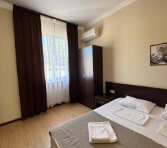 Комната стандарт с 1 двуспальной кроватью и диваном в Фортуна