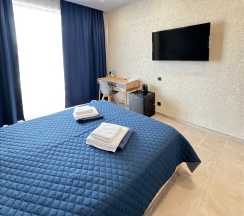 Стандарт с видом на окрестности и общим балконом (dbl+Extra Bed)) в Costa d`Ora