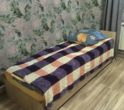 Кровать в общем номере в Алтгост