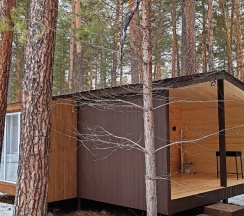 Двухместный коттедж Comfort с красивым видом из окна двуспальная кровать в Vinder Village