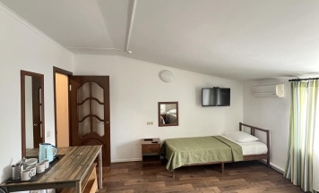 Номер стандарт с 4 односпальными кроватями в Домино