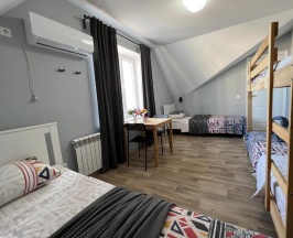 Кровать в общем номере (женский номер) в Гостевой Дом 125