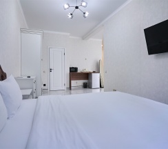 Люкс с гостиной и спальней в IL Punto