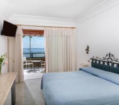 Двухместный номер Standard с видом на море двуспальная кровать в Hotel Pupetto