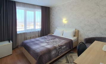 Номер стандарт с 1 двуспальной кроватью в Советская Гавань