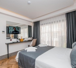 Двухместный номер Deluxe с частичным видом на море двуспальная кровать в Kas Pier Hotel