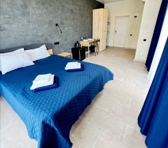 Стандарт с видом на окрестности и общим балконом (dbl+Extra Bed)) в Costa d`Ora