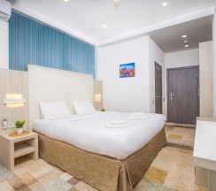 Делюкс с кроватью KING SIZE для 2 гостей в Мио