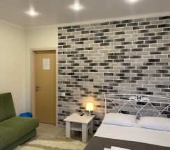 Двухместный семейный номер Standard с балконом и с красивым видом из окна двуспальная кровать в Алиса