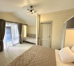 Стандартный семейный улучшенный четырёхместный номер в Жемчужина Абхазии