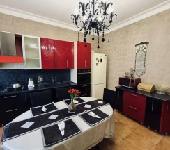 Шестиместные апартаменты с балконом в Гостевой дом