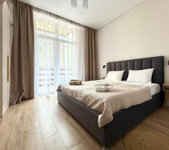 Новая квартира с отдельной спальней и кухней в Терсколе в El hotel