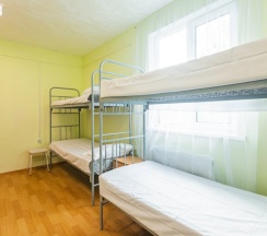 Кровать в общем номере в Nika