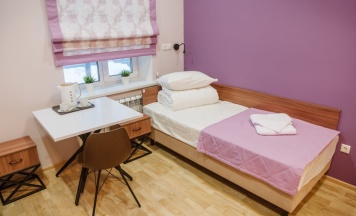 Кровать в общем номере в Motus