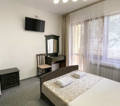 Номер с двуспальной кроватью в Киви