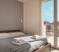 Двухместные семейные апартаменты c 1 комнатой двухъярусная кровать в Residence Sunrise Cesenatico