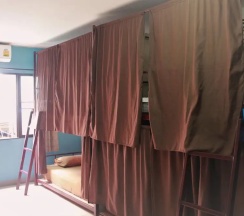 Кровать в общем номере в CM City Hostel