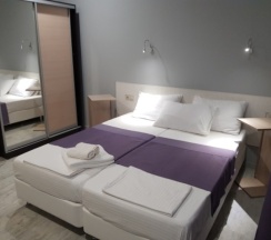 Двухместный номер с 2 отдельными кроватями и дополн. кроватью в GB