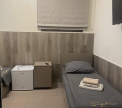 Комната эконом с 2 односпальными кроватями в Шесть гор