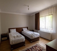 Вилла с 4 комнатами с балконом в Guzel Evler Family Resort