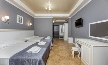 Семейный четырехместный номер в Plaza