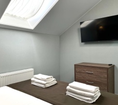 Четырёхместные апартаменты Superior с 2 комнатами с балконом и с красивым видом из окна в La Vida