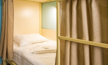 Кровать в 4-х местном  номере в Евразия