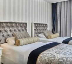 Четырёхместный семейный люкс в Salonika Suites