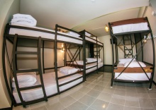 Кровать в общем номере в The 8 Factory Hotel Phitsanulok