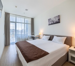 Двухкомнатные апартаменты с одной спальней (6-12 этаж) в Real Apartments Sochi