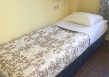 Кровать в 4-местных общих номерах в Никольский