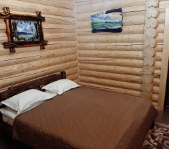 Двухместный коттедж с красивым видом из окна двуспальная кровать в Orange Village