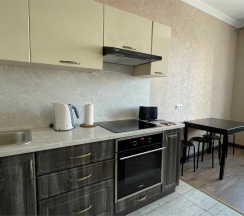 Апартаменты с кухней и спальней в Sibgat Apartments