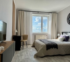 Апартаменты с панорамным видом на 16 этаже в Призма