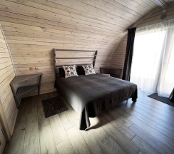 Двухместный коттедж двуспальная кровать в Хутор Пукинниеми