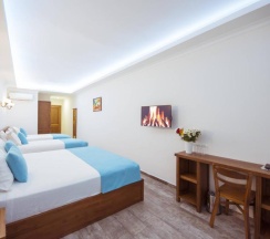 Четырёхместный номер Superior в Infinity City Hotel