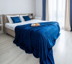 Номер Superior в Квартира на сутки Минск Маяк Метро 3 минуты Бесконтактное заселение Wi-Fi Кухня объединена с жилой зоной Отдельная спальня