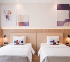 Номер "Делюкс" с двумя раздельными кроватями в Кортъярд Марриотт Сочи Красная Поляна