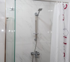 Двухкомнатный номер с двумя раздельными  кроватями в Великий Каспий