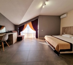 Семейный Мансардный номер FAMILY-M (с балконом) в Heliopark Aqua Resort