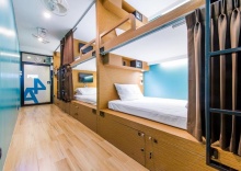 Кровать в общем номере в Matchbox Bangkok Hostel