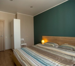 Апартаменты с гостиной и 2 спальнями. Вид на реку Казанку и аквапарк "Ривьера" в Sibgat Apartments