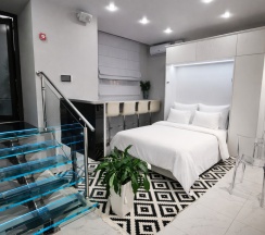 1-комнатные апартаменты с 1 двуспальной кроватью, 28.8 м², цокольный этаж в Апартаменты на Ветеранов