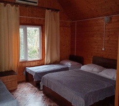 Четырёхместный домик с балконом в Гостевой дом