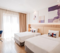 Номер "Стандарт" с двумя раздельными кроватями в Кортъярд Марриотт Сочи Красная Поляна