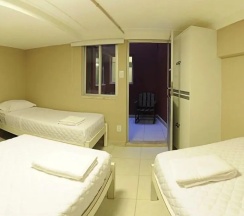 Кровать в общем номере в Bahia Prime Hostel