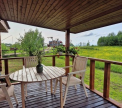 Дом с 2 комнатами с видом на озеро в Глэмпинг на озере Сиг