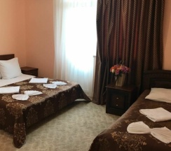 Четырехместный номер Делюкс с балконом в Unona family