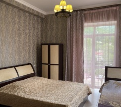 Трёхместный номер Deluxe с балконом и с красивым видом из окна в Stone house