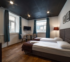 ДВУХМЕСТНЫЙ НОМЕР С 2 ОДНОСПАЛЬНЫМИ КРОВАТЯМИ и общей ванной комнатой в Proloft city hostel&rooms